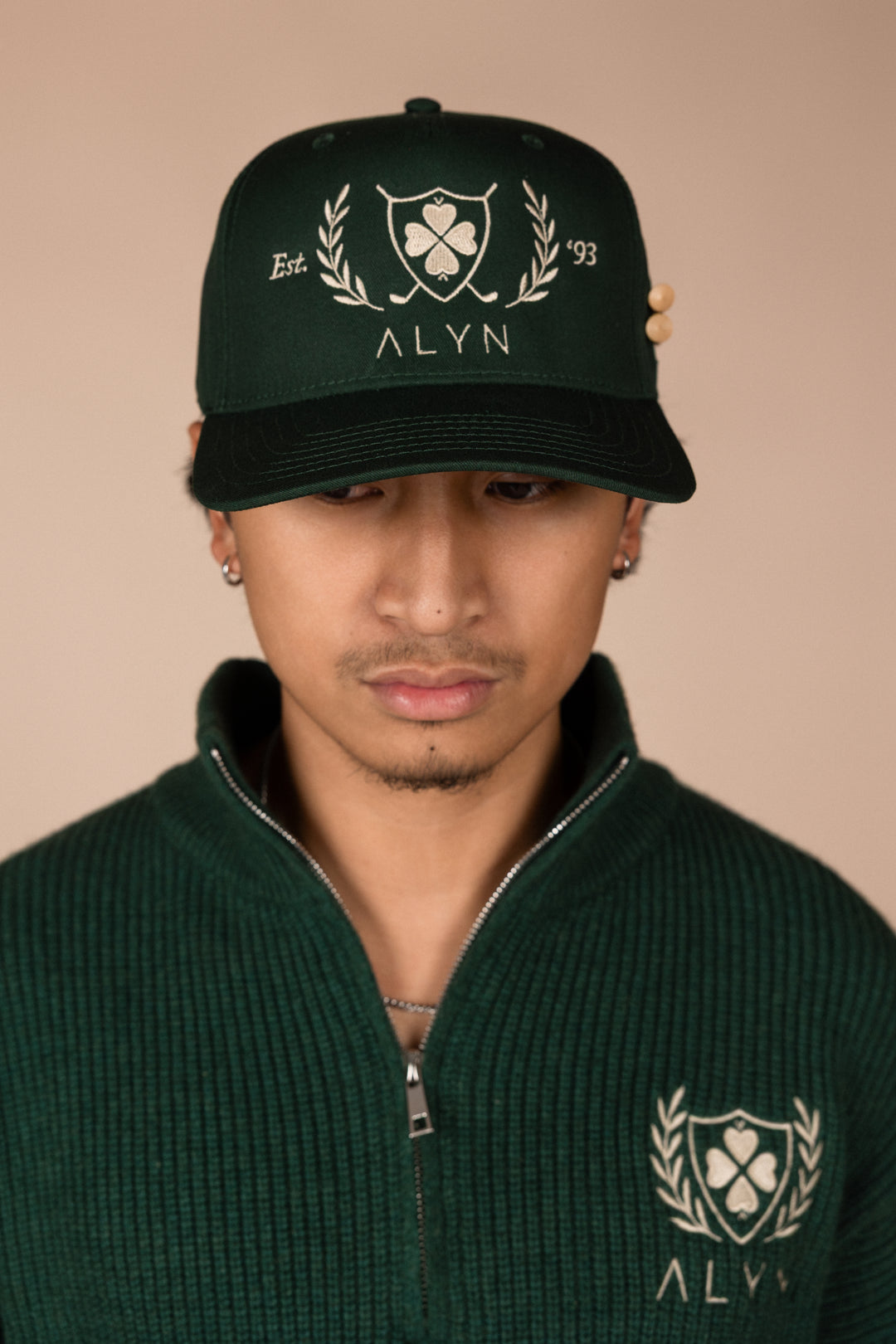 ALYN Crest Trucker Hat